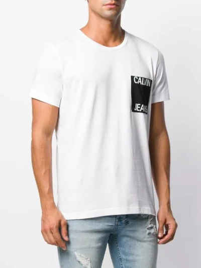 Shop Calvin Klein Jeans Est.1978 Logo Print Pocket T-shirt In White