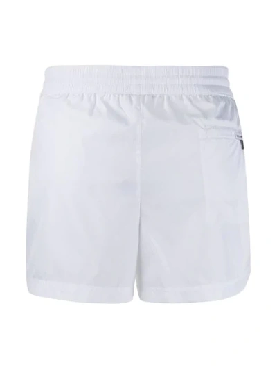 Shop Dolce & Gabbana Short Plain Swimming Shorts In White