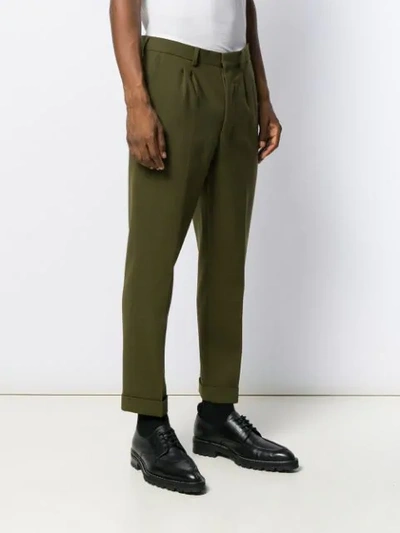 Shop Ami Alexandre Mattiussi Carrot Fit Pleated Trousers In Green