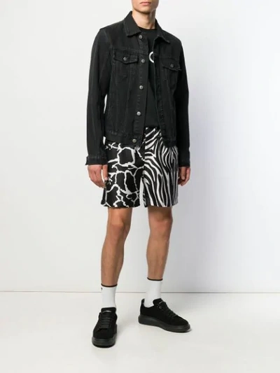 Shop Versace Animal Print Shorts In Black