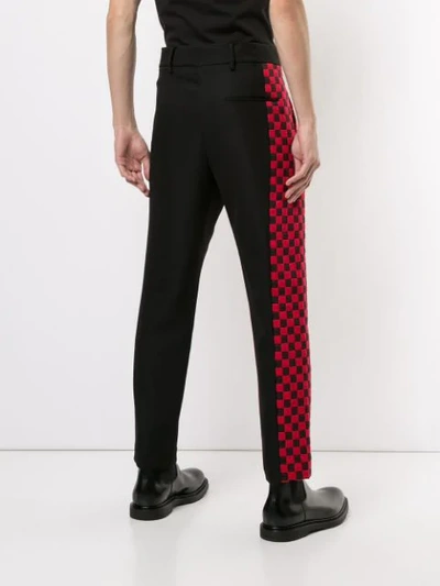 Shop Haider Ackermann Checkered Stripe Trousers In Black
