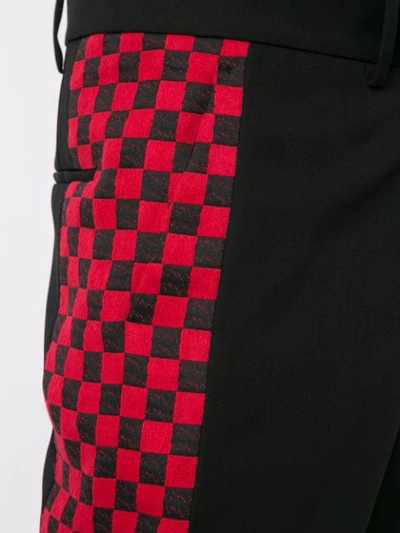 Shop Haider Ackermann Checkered Stripe Trousers In Black