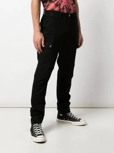 Shop Amiri Slim-fit Cargo Trousers In Black