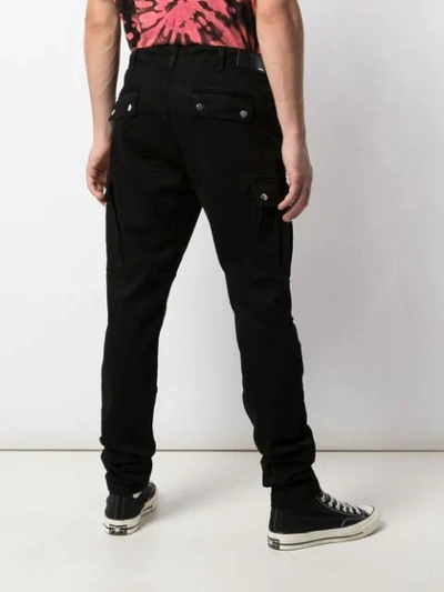 Shop Amiri Slim-fit Cargo Trousers In Black