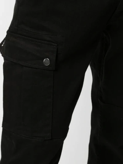 Shop Amiri Slim-fit Cargo Trousers In Black