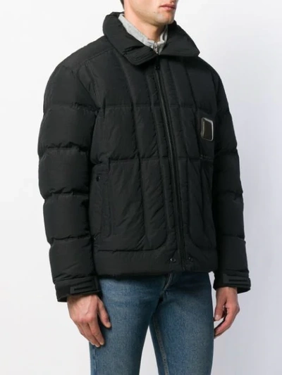 DOWN JACKET WITH WINDOW DETAILS