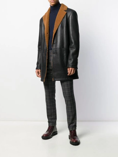 Shop Desa 1972 Shearling-lined Coat In Black