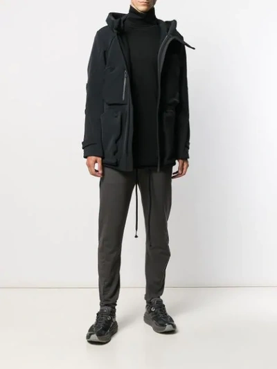 Shop Devoa Multi-pocket Hooded Jacket In Black