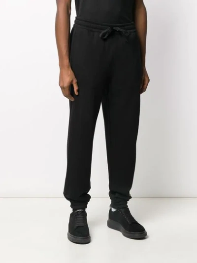Shop Burberry Contrast Panel Track Pants In A1189 Black