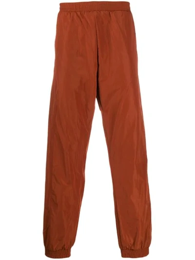 Shop A-cold-wall* Overlock Nylon Track Pants In Orange