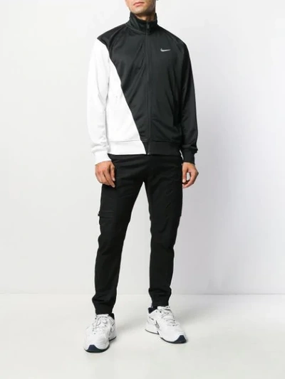 Shop Nike Asymmetric Colour-block Jacket In Black