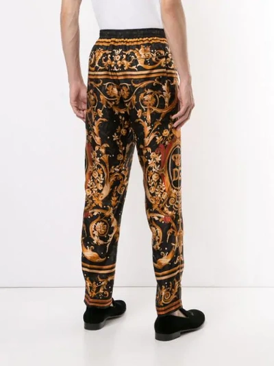 Shop Dolce & Gabbana Graphic Print Trousers In Black