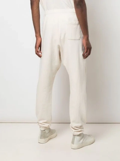 Shop John Elliott Drawstring Track Pants In White