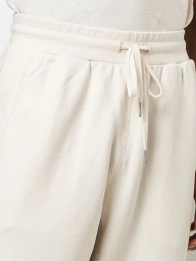 Shop John Elliott Drawstring Track Pants In White