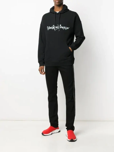 Shop Givenchy Kapuzenpullover Mit Geblümtem Logo In Black