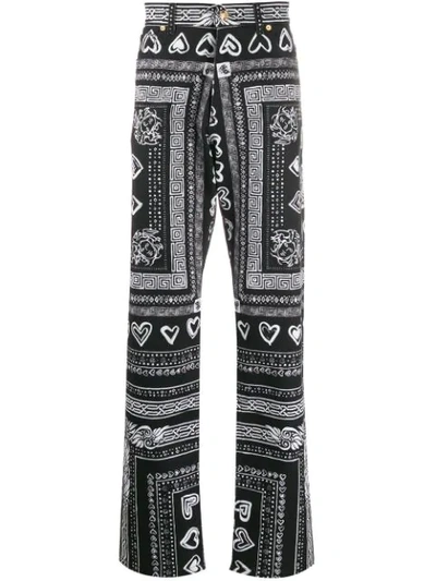 Shop Versace Bandana Print Wide-leg Jeans In Black