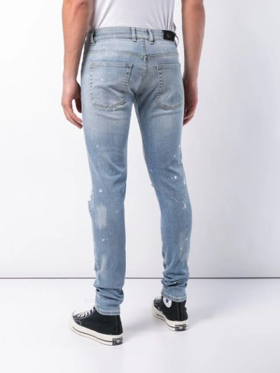 Shop Represent Straight-leg Distressed Jeans In Blue