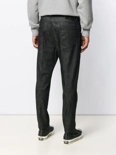 Shop Dsquared2 Zipped Pockets Tapered Jeans In Black