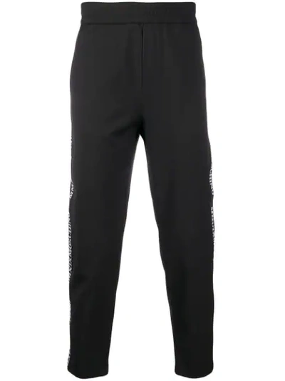 Shop Moschino Logo Trim Track Pants In Black