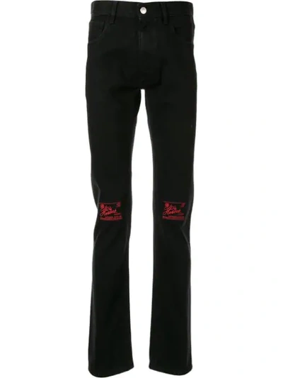 Shop Raf Simons Slim-fit Logo Patch Jeans In Black