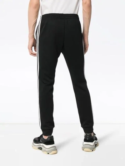 Shop Adidas Originals Superstar Track Pants In Black