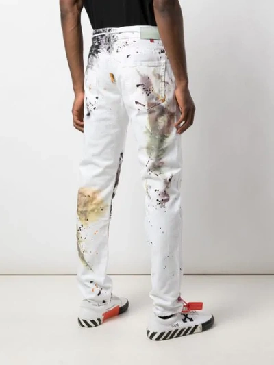 Shop Off-white Paint Splatter Slim-fit Jeans In White