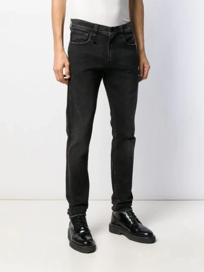 Shop R13 Distressed Skinny Jeans In Black