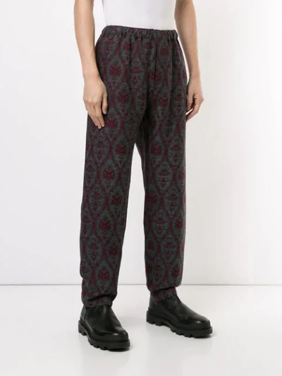 Shop Undercover X Valentino Loose Fit Trousers In Red