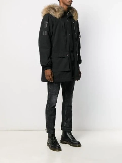 Shop Amiri Full-length Hooded Fur Parka Coat In Blk Black