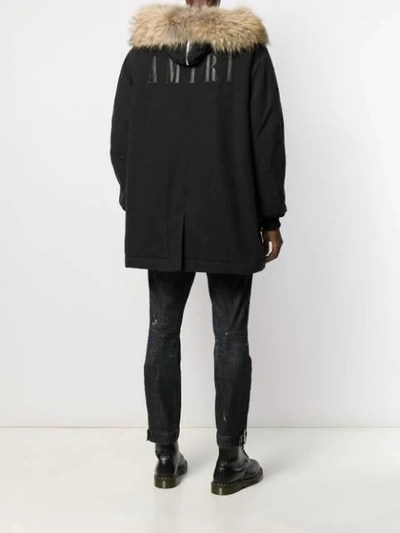 Shop Amiri Full-length Hooded Fur Parka Coat In Blk Black