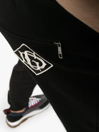 Shop Dolce & Gabbana Straight Leg Track Pants - Black