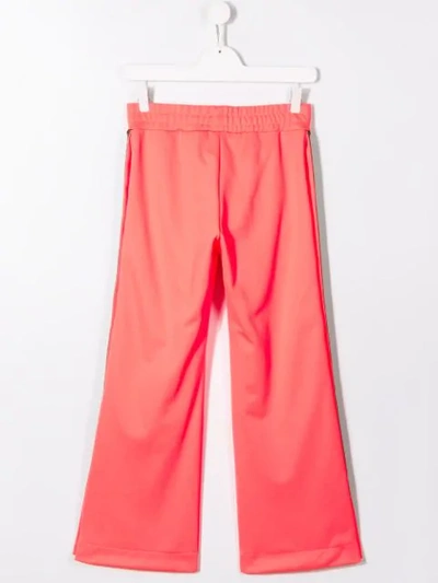 Shop Fendi Teen Side-stripe Flared Trousers In Orange