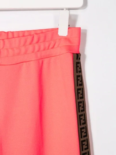 Shop Fendi Teen Side-stripe Flared Trousers In Orange