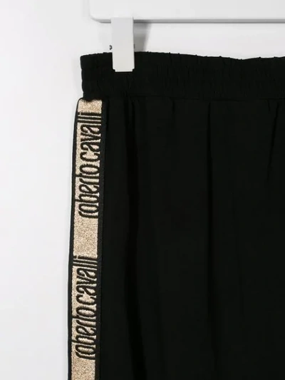 Shop Roberto Cavalli Junior Teen Logo Print Track Skirt In Black