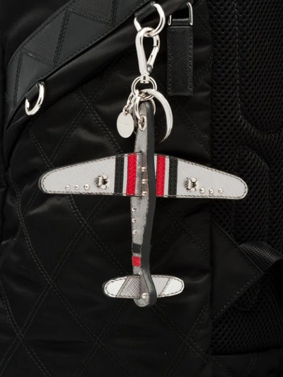 Shop Prada Key Trick Plane Keyring - Grey