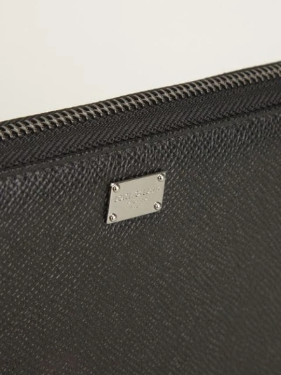 Shop Dolce & Gabbana Zip Fastening Coat Wallet In Black