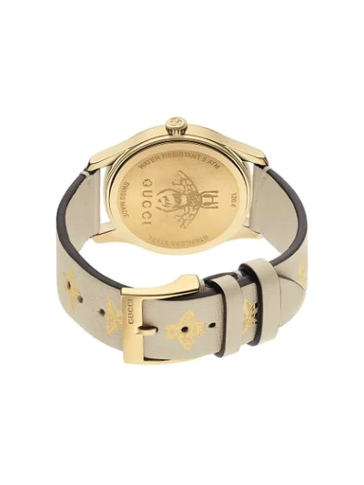 Shop Gucci G-timeless Watch In Gold
