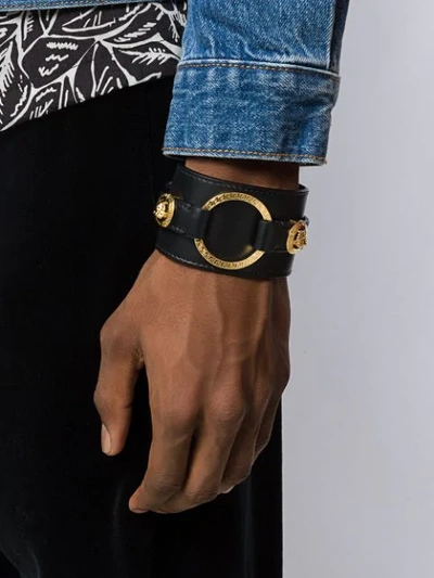 Shop Versace Engraved Medusa Detailed Bracelet In Black