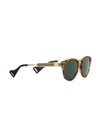 Shop Gucci Round Frame Sunglasses In Brown