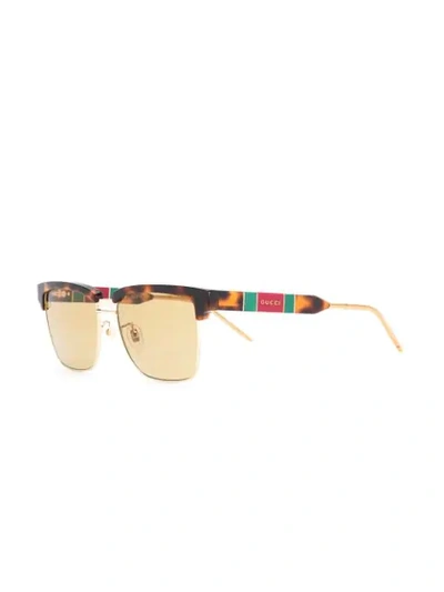 Gucci Tortoiseshell Effect Sunglasses In Gold