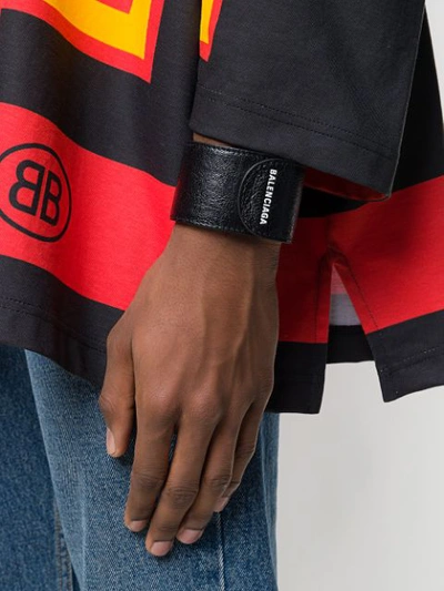 Shop Balenciaga Logo Print Bracelet In Black