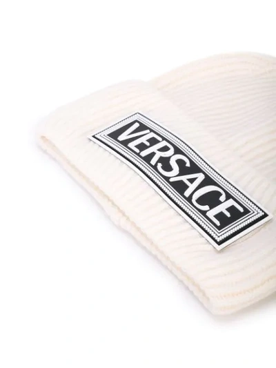 Shop Versace Logo Patch Beanie In White