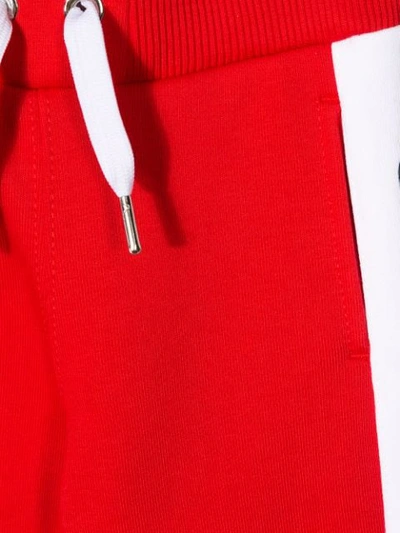 Shop Givenchy Logo Track Pants In Red