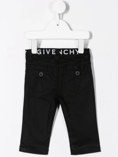 Shop Givenchy Logo Embroidered Jeans In Black