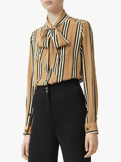 Shop Burberry Icon Stripe Pussy-bow Blouse In Neutrals