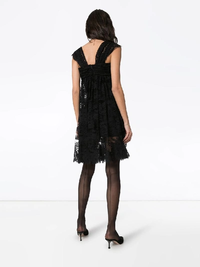 Shop Dolce & Gabbana Sheer Lace Mini Dress In Black