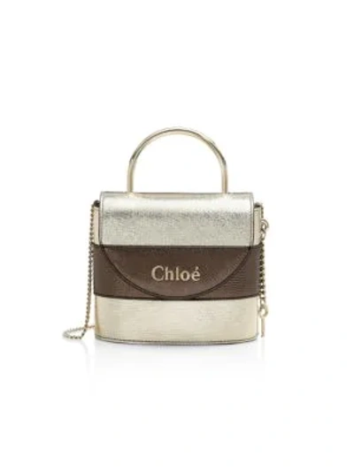 Shop Chloé Small Aby Metallic Leather Top Handle Bag In Neutral