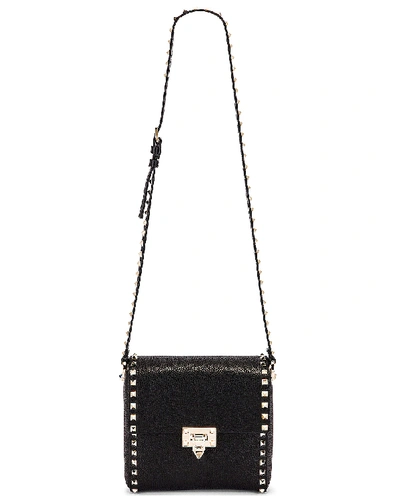 Shop Valentino Rockstud Shoulder Bag In Black