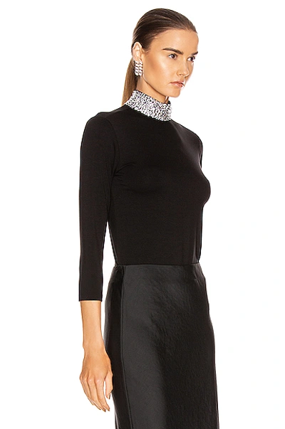 Shop L Agence Mya Embellish Mock Neck Top In Black