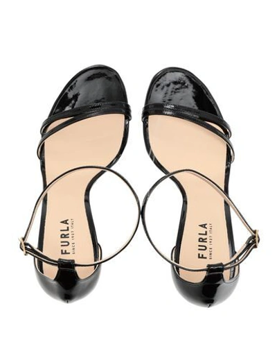 Shop Furla Sandals In Black